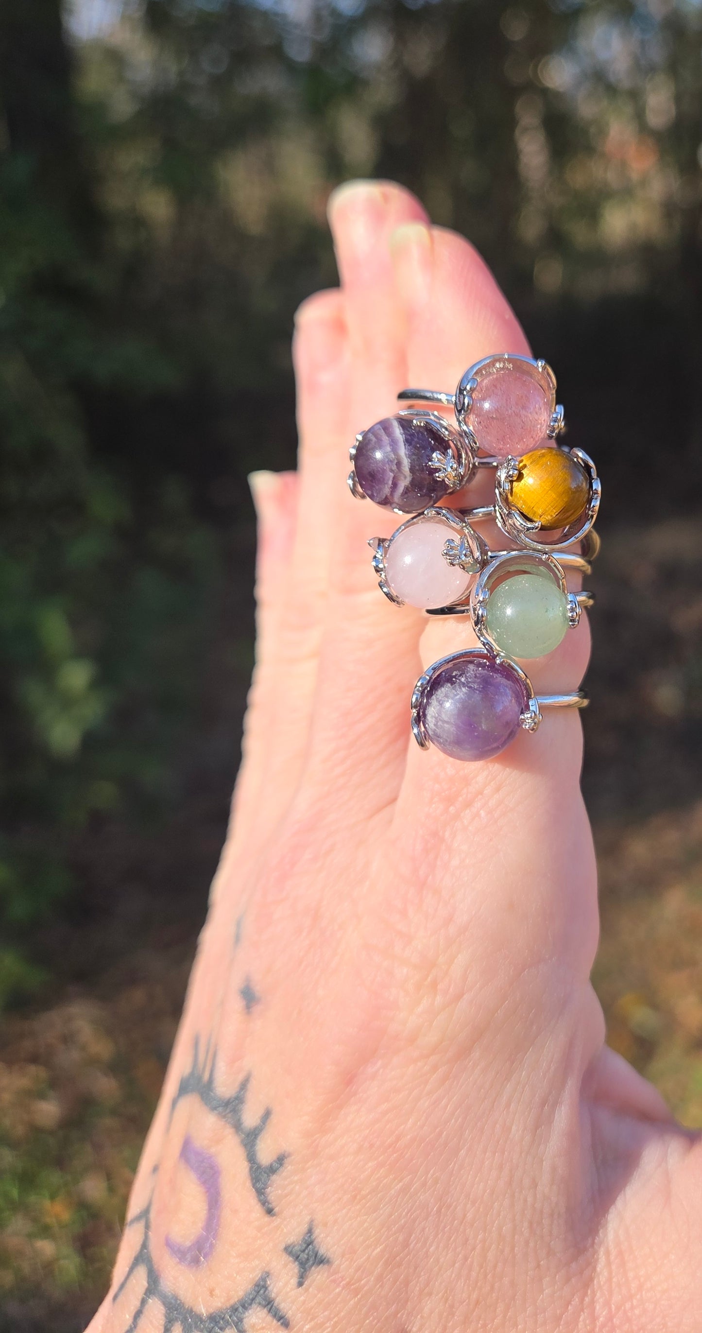Peacock Crystal Spinner Rings