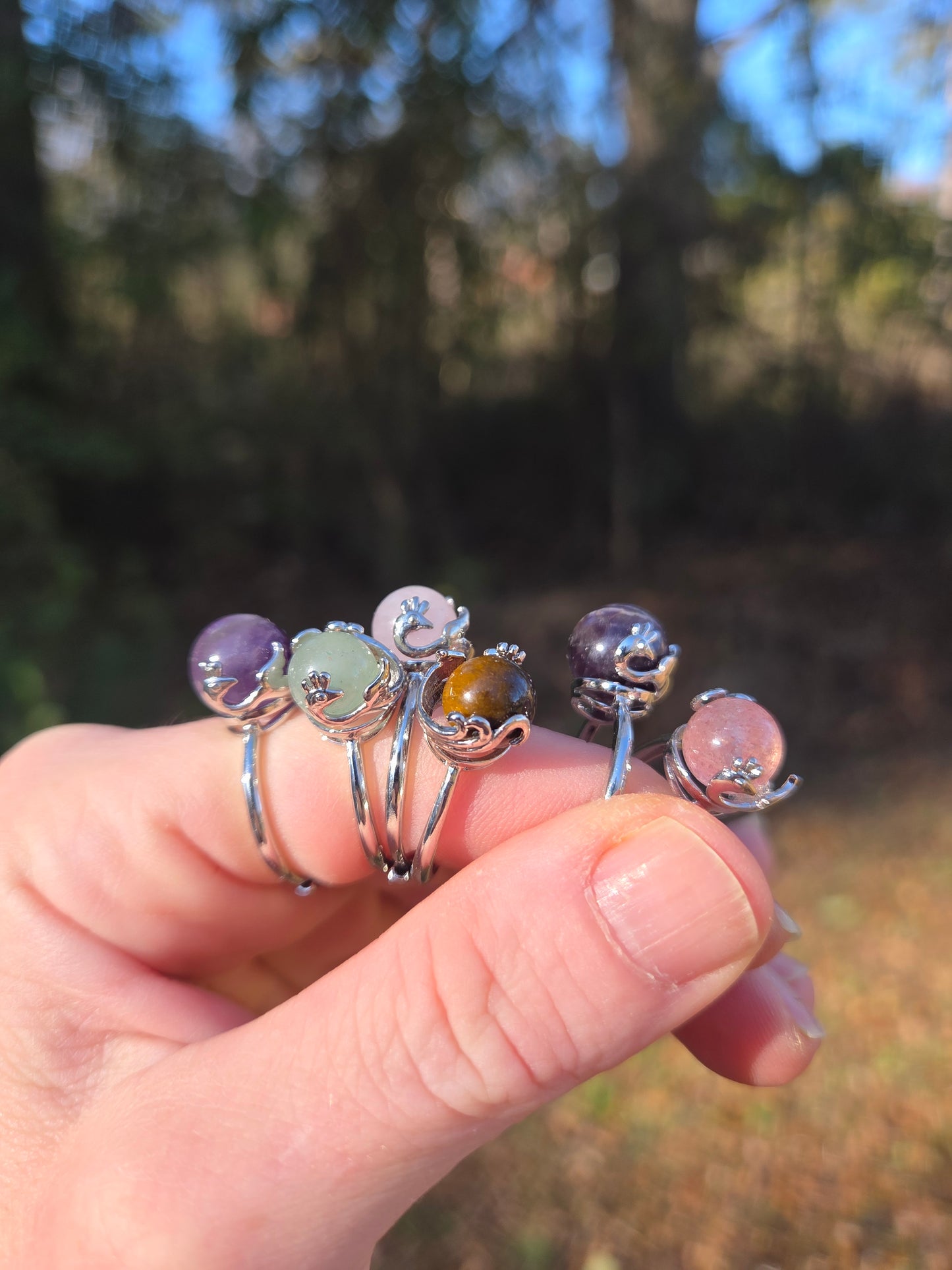 Peacock Crystal Spinner Rings