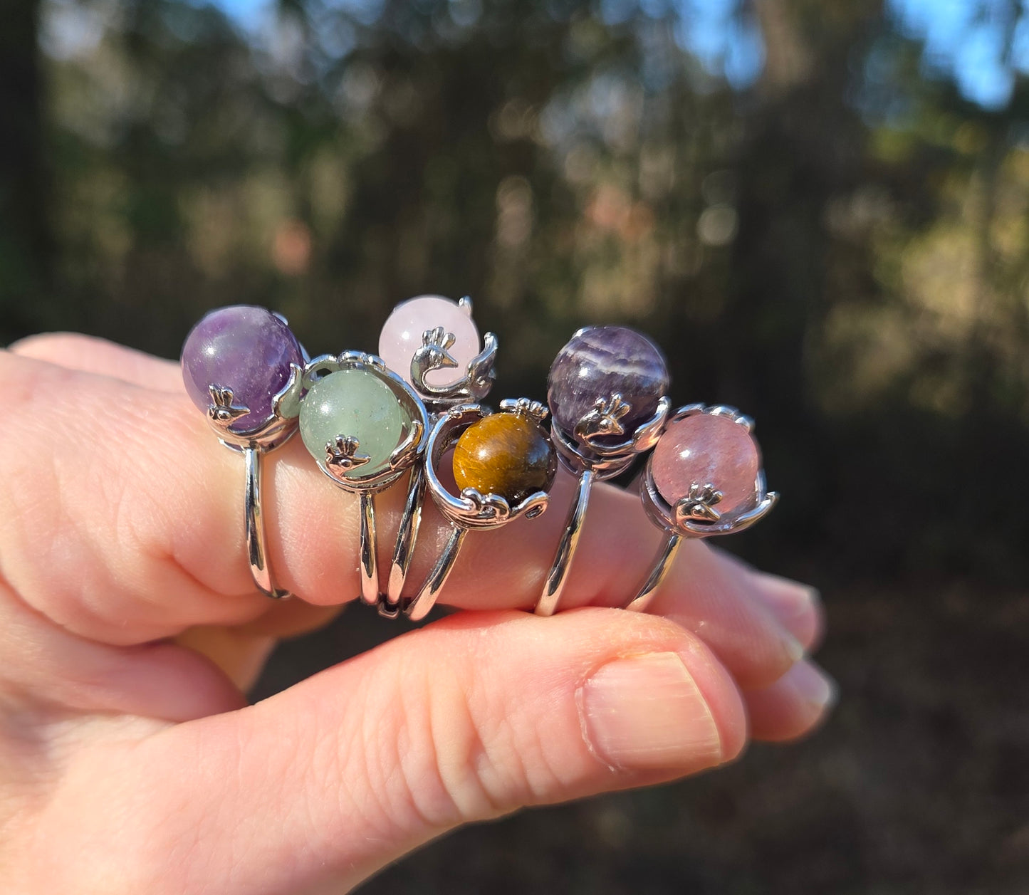 Peacock Crystal Spinner Rings